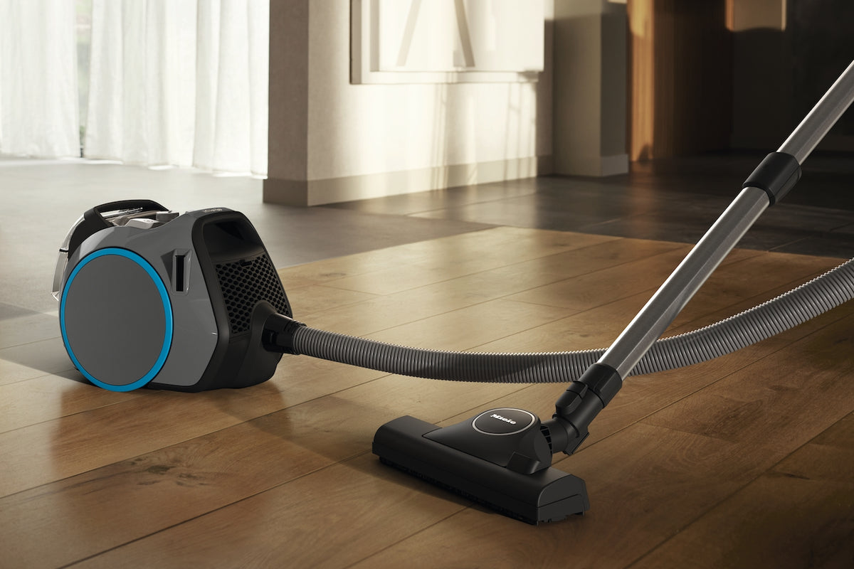 Boost CX1 11640630 graphite grey vacuum cleaning a timber floor
