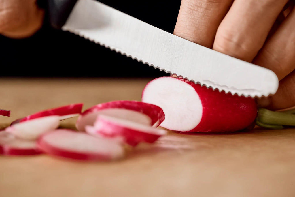 Victorinox Swiss Classic black tomato knife slicing radish