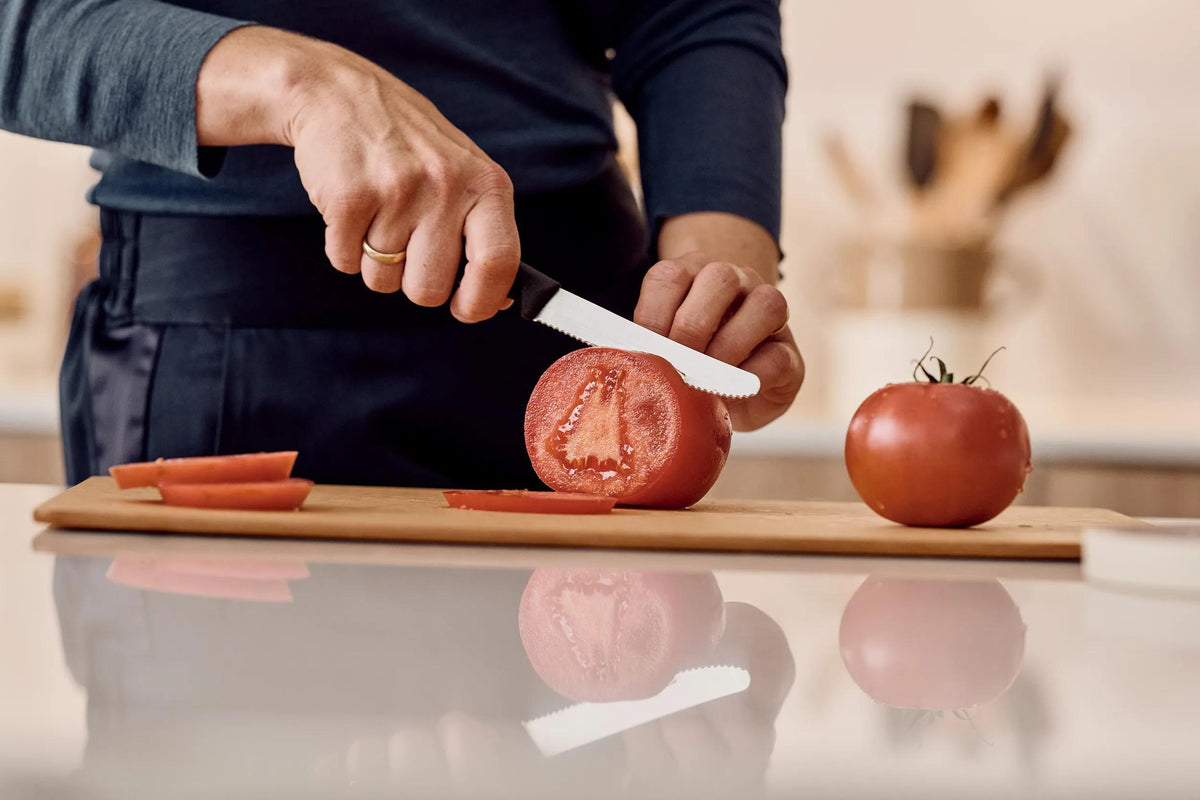 Victorinox Swiss Classic black tomato knife slicing tomato