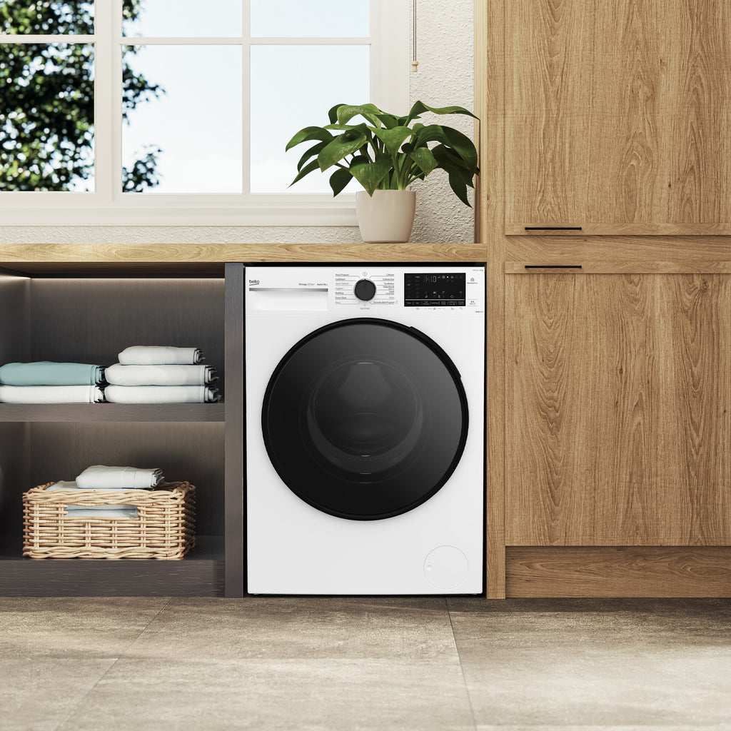 Beko BFLB903ADW1 white washing machine in laundry setting