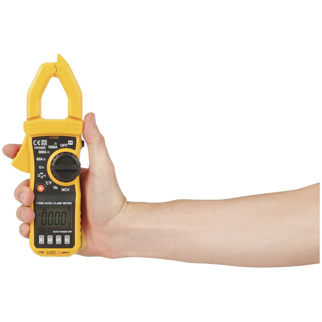 QM1634 1000A AC/DC clamp meter shown in hand for scale