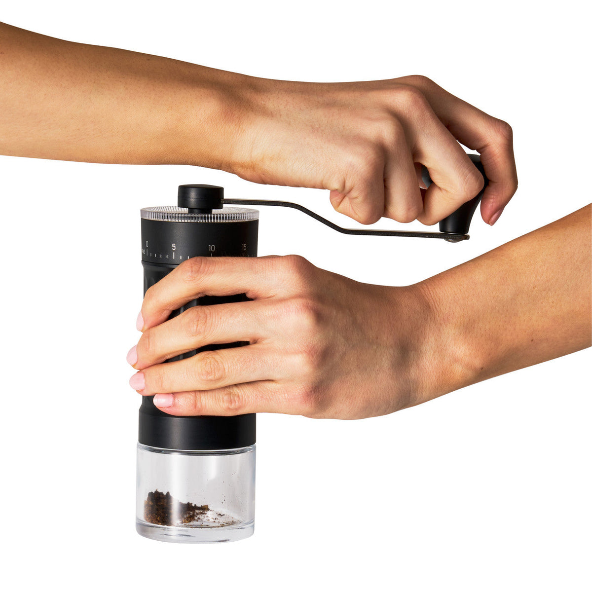 Avanti manual coffee grinder in use
