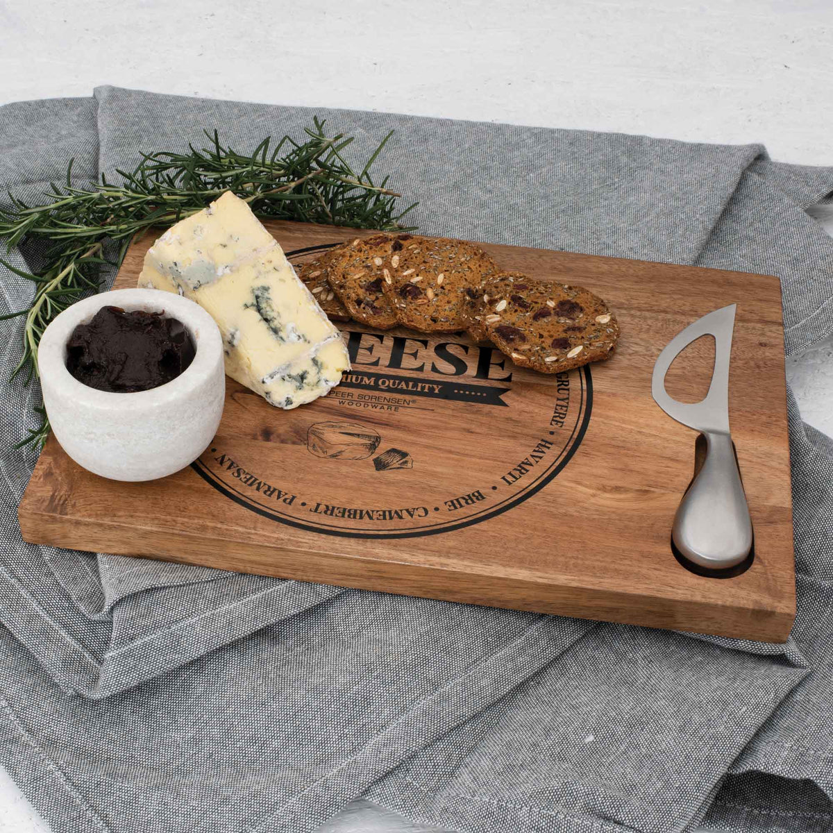 Peer Sorensen acacia cheese board and knife with a serving arrangement