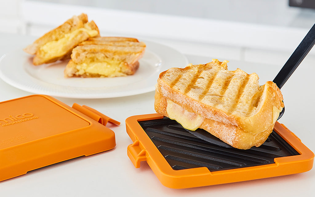 Morphy Richards MICO 511644 microwave toastie maker open with sandwich