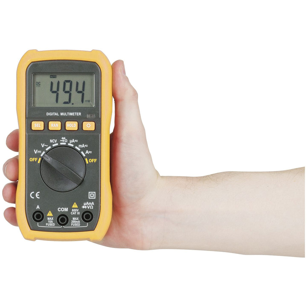 QM1529 autoranging multimeter shown in hand