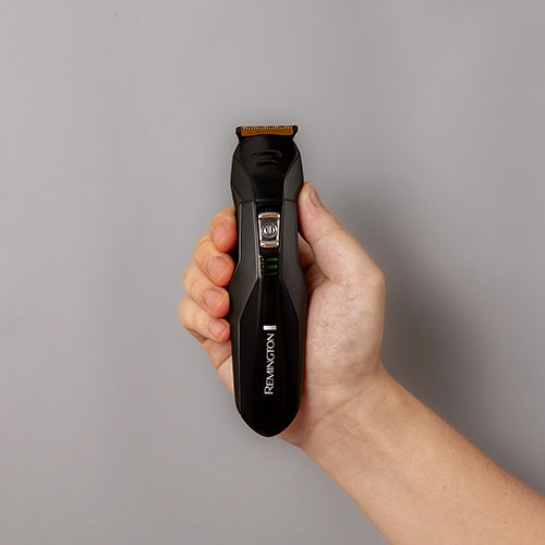 Remington PG6024AU grooming trimmer held in hand