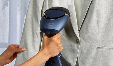 Russell Hobbs RHC410 garment steamer in use