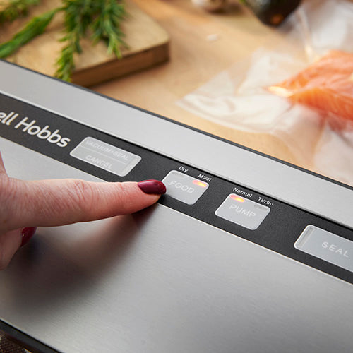 Russell Hobbs RHVS1 vacuum sealer controls in use