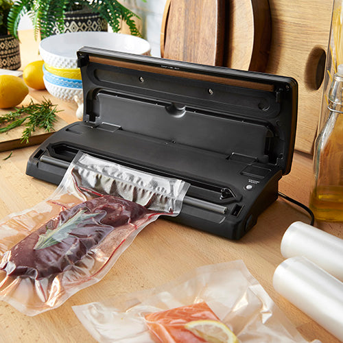 Russell Hobbs RHVS1 vacuum sealer open with food bag